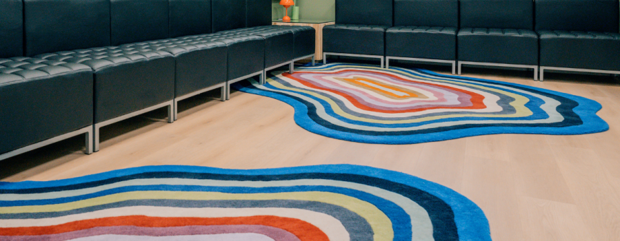 Group room at Daylight with multicolored curved rugs